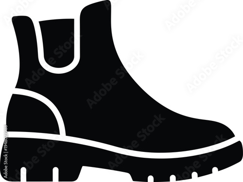 A black silhouette icon representing a classic chelsea boot with a thick sole for casual footwear