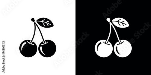 Black and white cherries with leaves on white and black backgrounds