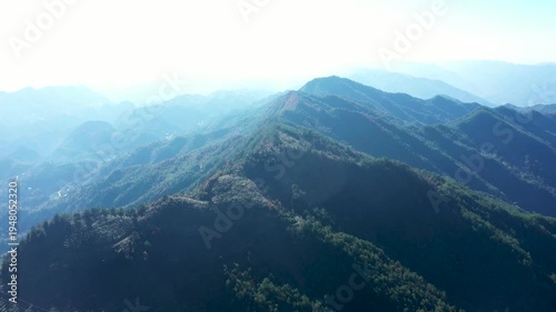 Wallpaper Mural 4K Aerial View of Majestic Mountain Ranges in Remote Depths Torontodigital.ca