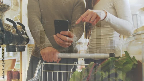 Animation of financial data processing over caucasian people shopping