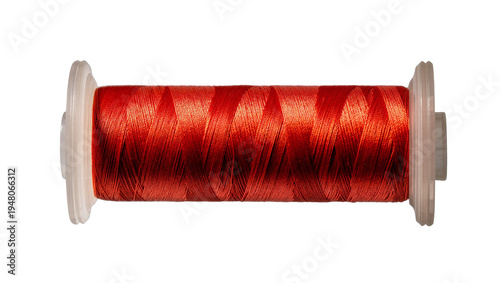 Tableau sur toile Isolated vibrant red sewing thread spool on a bobbin, perfect for crafts and emb
