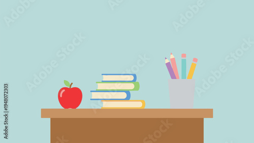 A desk with an apple, stacked books and colored pencils on a table indoors for education