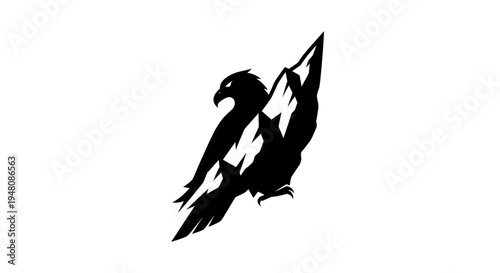 Eagle silhouette on mountain peak