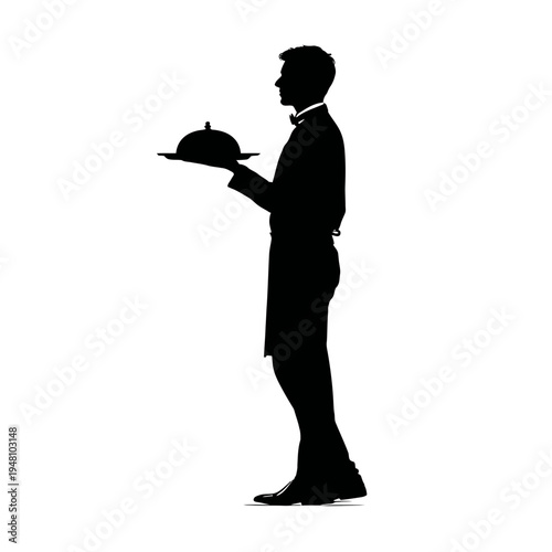 Waiter holding covered serving dish.