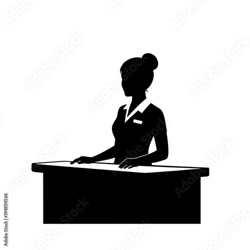 Silhouette of a woman standing behind a counter, possibly a receptionist or cashier.