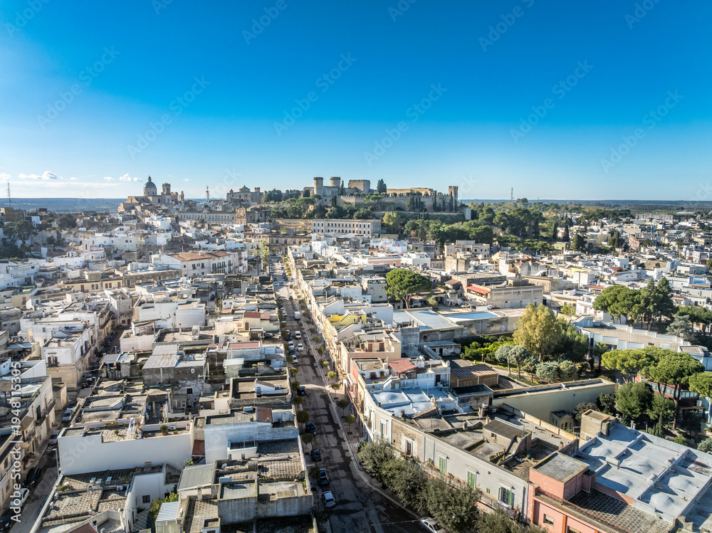 Fototapeta premium Aerial view of Oria town with medieval hilltop castle in the background