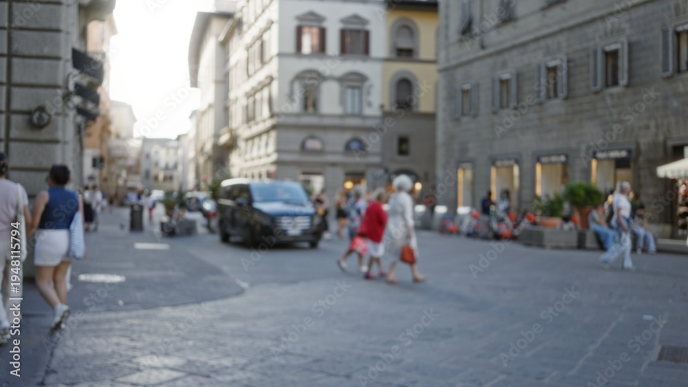 Fototapeta premium Urban street scene in shallow bokeh with softened architecture and distant vehicles; background backdrop copyspace backplate.