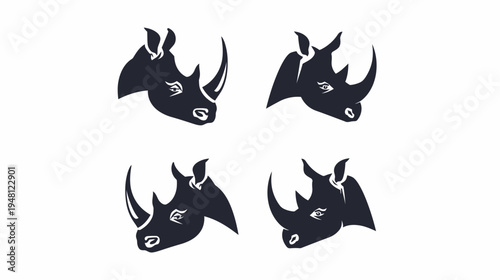 A dark silhouettes of rhino heads arranged in a square against a white background