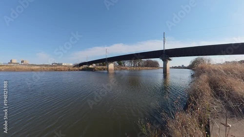 Wallpaper Mural Train Approaching on a Bridge Over a River, Static Shot of Railway Crossing. Torontodigital.ca