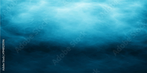 A beautiful abstract landscape of a dark blue sky with clouds reflecting over the deep blue ocean waves at the summer horizon