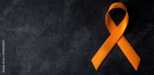 Orange Ribbon on Black Background for Awareness Campaigns
