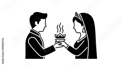 Indian bride and groom performing traditional wedding ritual with sacred fire