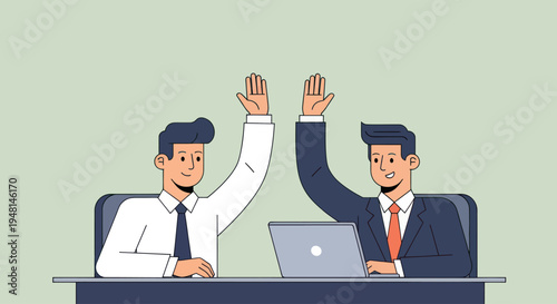 Two businessmen high five at desk.