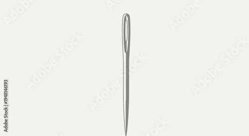 Closeup of a silver sewing needle.