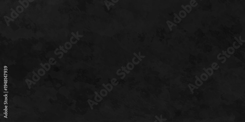 Distressed rough black cracked wall slate texture wall grunge backdrop smoke background. Stone concrete texture anthracite panorama. Old vintage charcoal night dark black stucco design.
