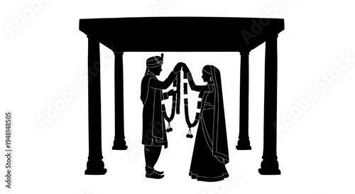 Indian wedding couple exchanging flower garlands traditional marriage ceremony