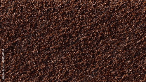 Seamless Full-Frame Macro Texture of Finely Ground Coffee Powder in Warm Brown Tones