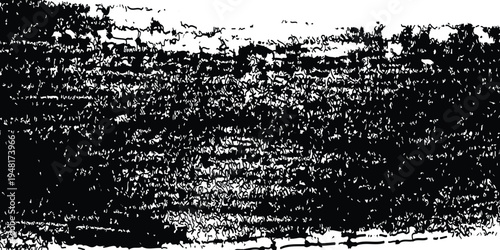 A black and white image of a large crowd in a stadium with a fence in the foreground and trees in the background on a bright day