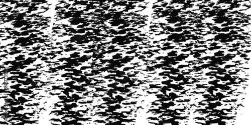 A dense cluster of small black flowers or leaves on a white background resembling a botanical pattern or a natural abstract design element closely