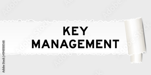 Ripped gray paper background that have word key management under torn part