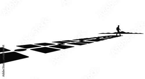 man walking on a road with a long shadow