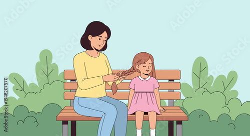 Woman and little girl sitting together.