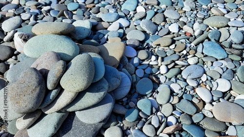 Beautiful multi-colored sea pebbles on the beach
