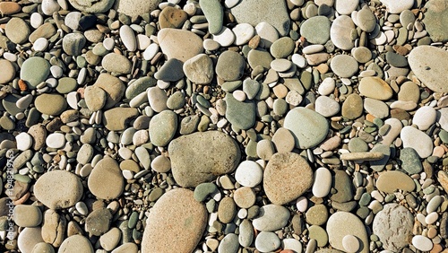 Beautiful multi-colored sea pebbles on the beach