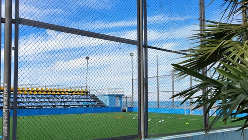 A large football stadium with open stands