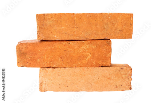 Side view of three cracked old red or orange bricks in stack isolated with clipping path in png file format