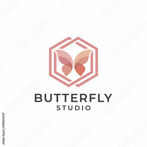 This logo artfully features butterfly shapes within a hexagon, representing transformation, creativity, and beauty, ideal for a studio focused on artistic endeavors.