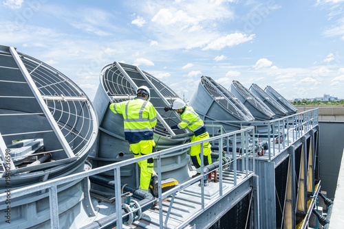 Canvastavla Professional Worker Teamwork Servicing HVAC building cooling tower, Industry air