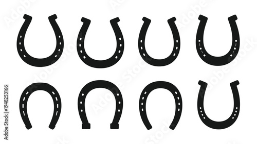 Set of eight black horseshoe silhouettes showing different styles for luck symbols or equestrian themed designs.