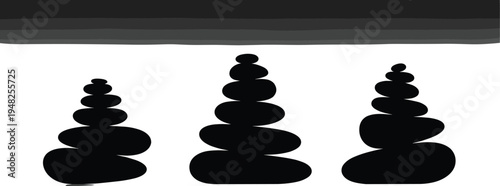 Black stone cairns on white background with gray gradient rocks stacked rocks