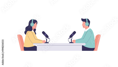 Two people sitting at a table with microphones and headphones on