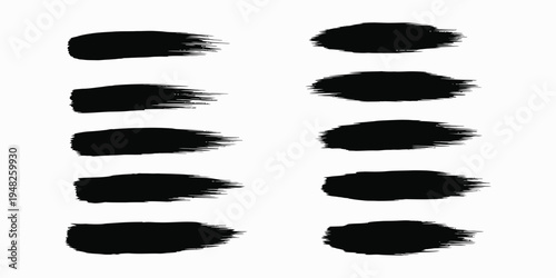 A collection of black brush strokes on a white background