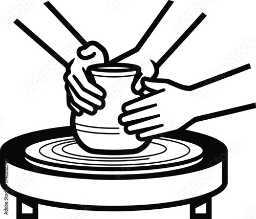 Potter shaping clay on wheel