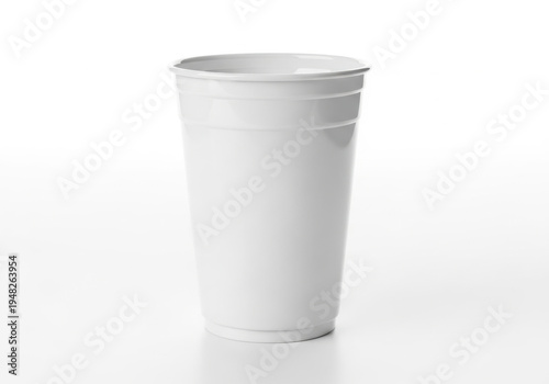 Wallpaper Mural A plain white disposable paper cup standing upright on a flat surface Torontodigital.ca