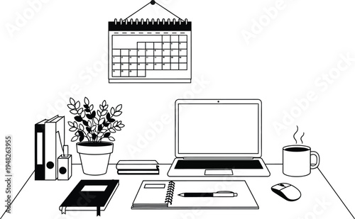 home office workspace with laptop and stationery