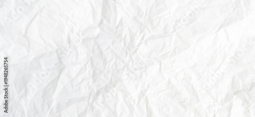 Top view and full frame of wrinkled or crumpled white paper texture used as crumpled white paper background texture in decorative art work