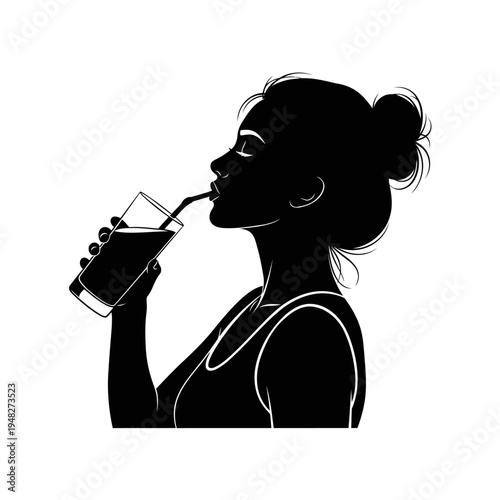 A woman drinking a beverage from a glass with a straw