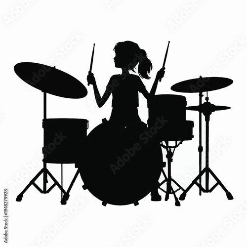 Silhouette of a female drummer playing a full drum set Keywords: female drummer, drum set, playing, music, percussion, rhythm
