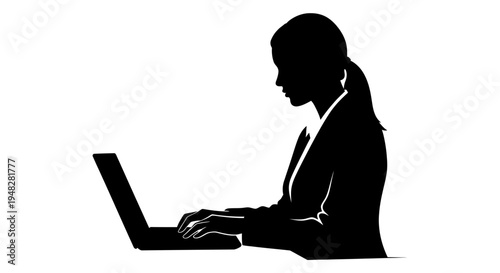 Silhouette of a woman working on a laptop computer.