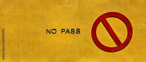 Red sign of no pass, access or entrance on yellow wall background with copy space. Symbol give direction and are not allowed to go.