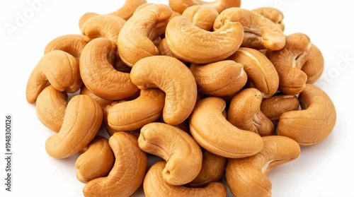 A pile of cashews on a white background for a healthy snack
