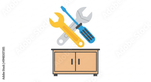 Toolbox and wrench on a cabinet with screwdriver and adjustable spanner on top for home repair and diy projects