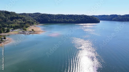 Wallpaper Mural Aerial View of the Lakeside Sunset Marina Resort on Dale Hollow Lake With Highway 111 Bridge, Boats and Forested Shoreline, Calm Water on a Sunny Day, Monroe, Tennessee, USA. Torontodigital.ca