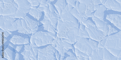 Cracked Ice Texture: A close-up aerial view reveals the intricate, abstract patterns of cracked ice, showcasing a palette of cool blues and stark whites, creating a mesmerizing frozen landscape.
