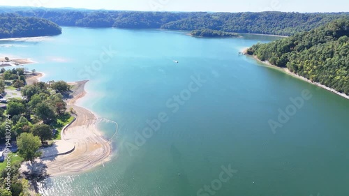 Wallpaper Mural Aerial View of the Lakeside Sunset Marina Resort on Dale Hollow Lake With Highway 111 Bridge, Boats and Forested Shoreline, Calm Water on a Sunny Day, Monroe, Tennessee, USA. Torontodigital.ca
