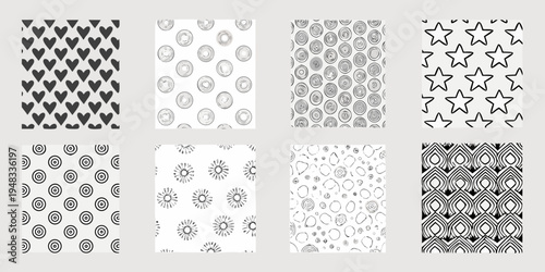 Eight black and white patterned squares arranged in a grid formation